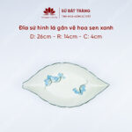 Eliptical leafshape with blue lotus blossom painted